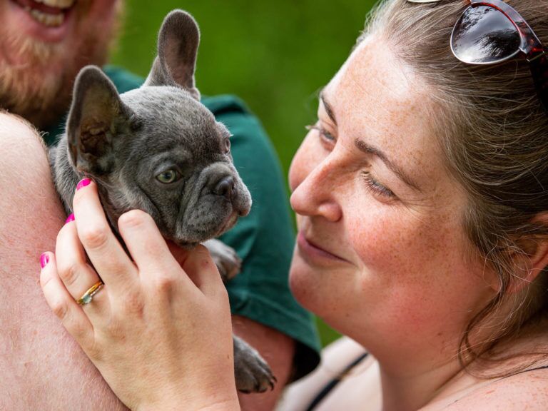 Kevin the bulldog puppy with new owner Katie