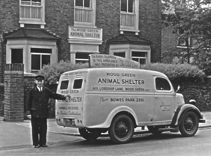 Black and white photo of van outside the Wood Green Animal Shelter on Lordship Lane, 1920s